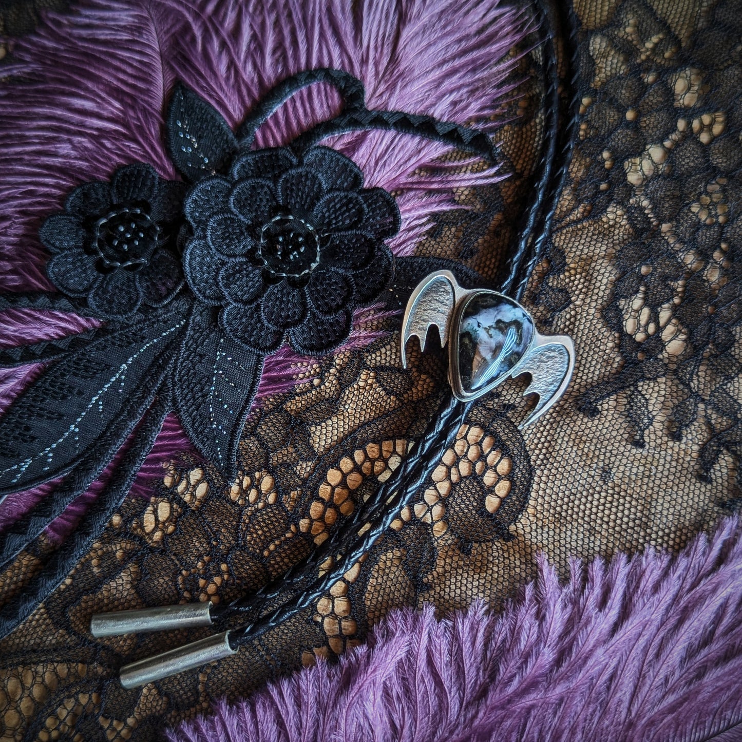 Merlinite Batty Bolo Tie